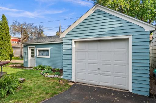 Spacious 1 car garage with workshop attached.