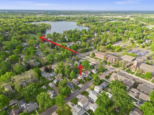 The shorter arrow denotes the property, and the longer arrow shows the 2 blocks to Silver Lake Park via Margaret St.