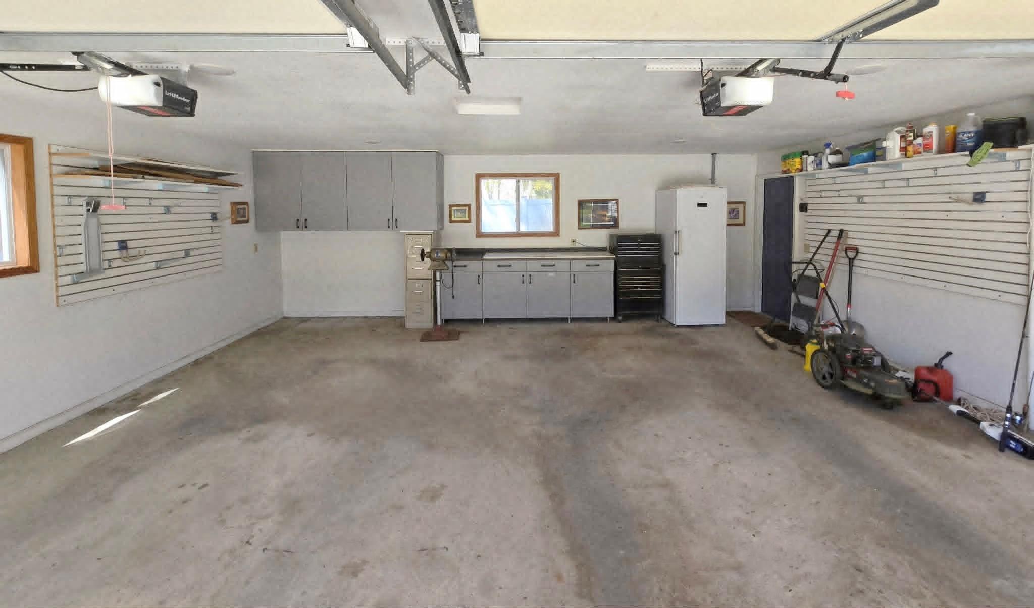 Insulated attached garage with built ins