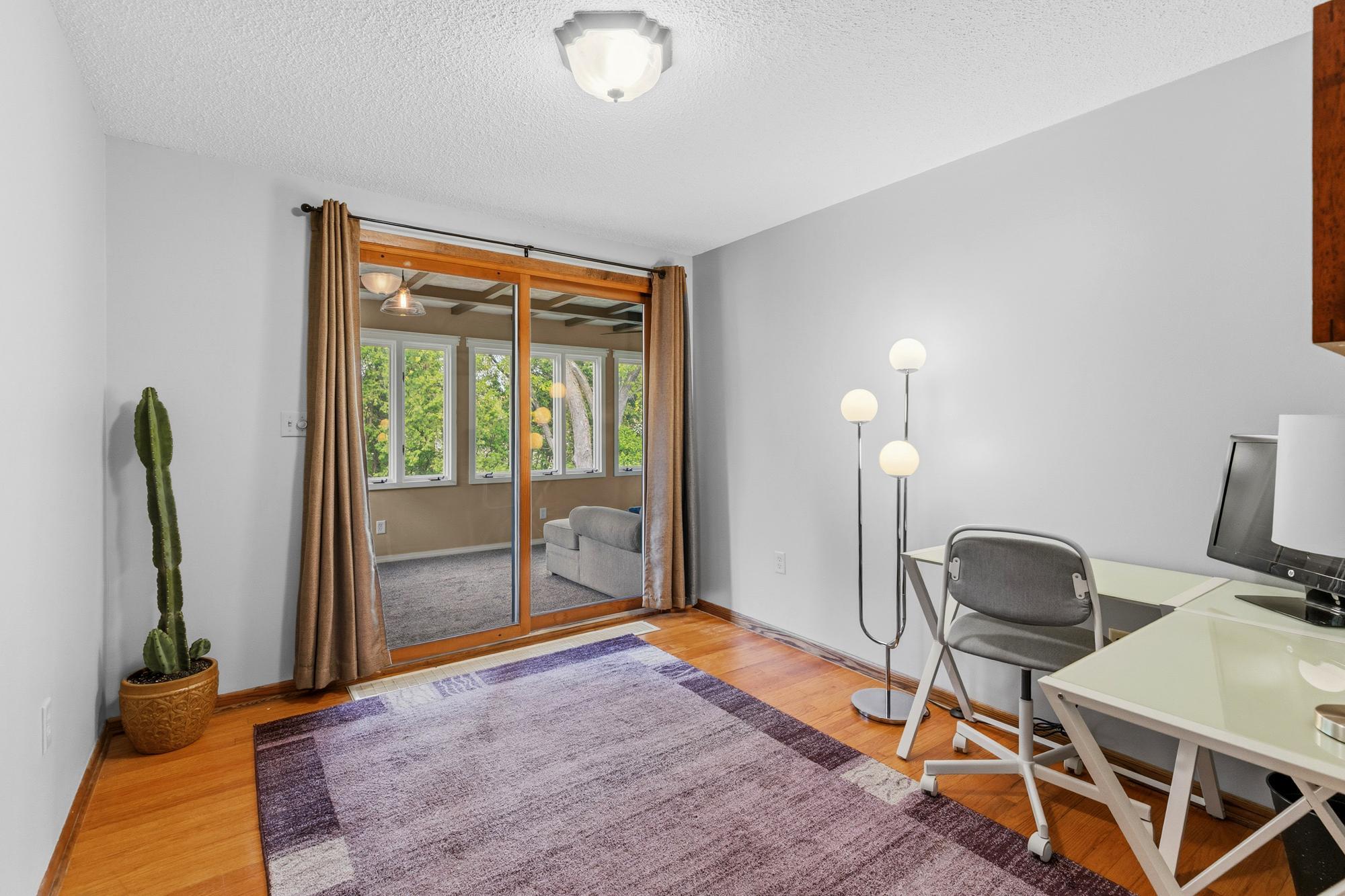 Upper level bedroom #2 and it leads to the sunroom.