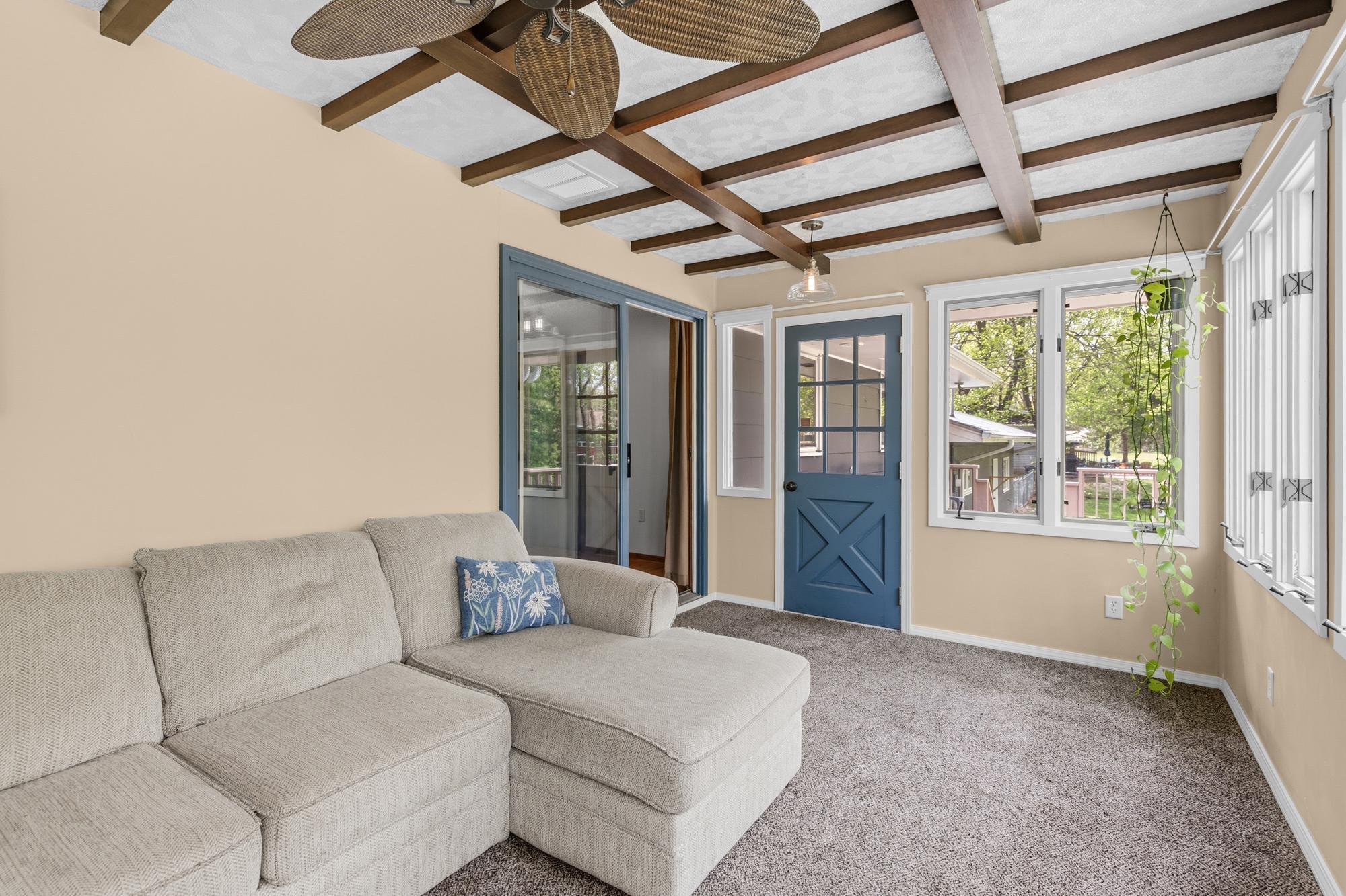 The sunroom walks out to the deck.
