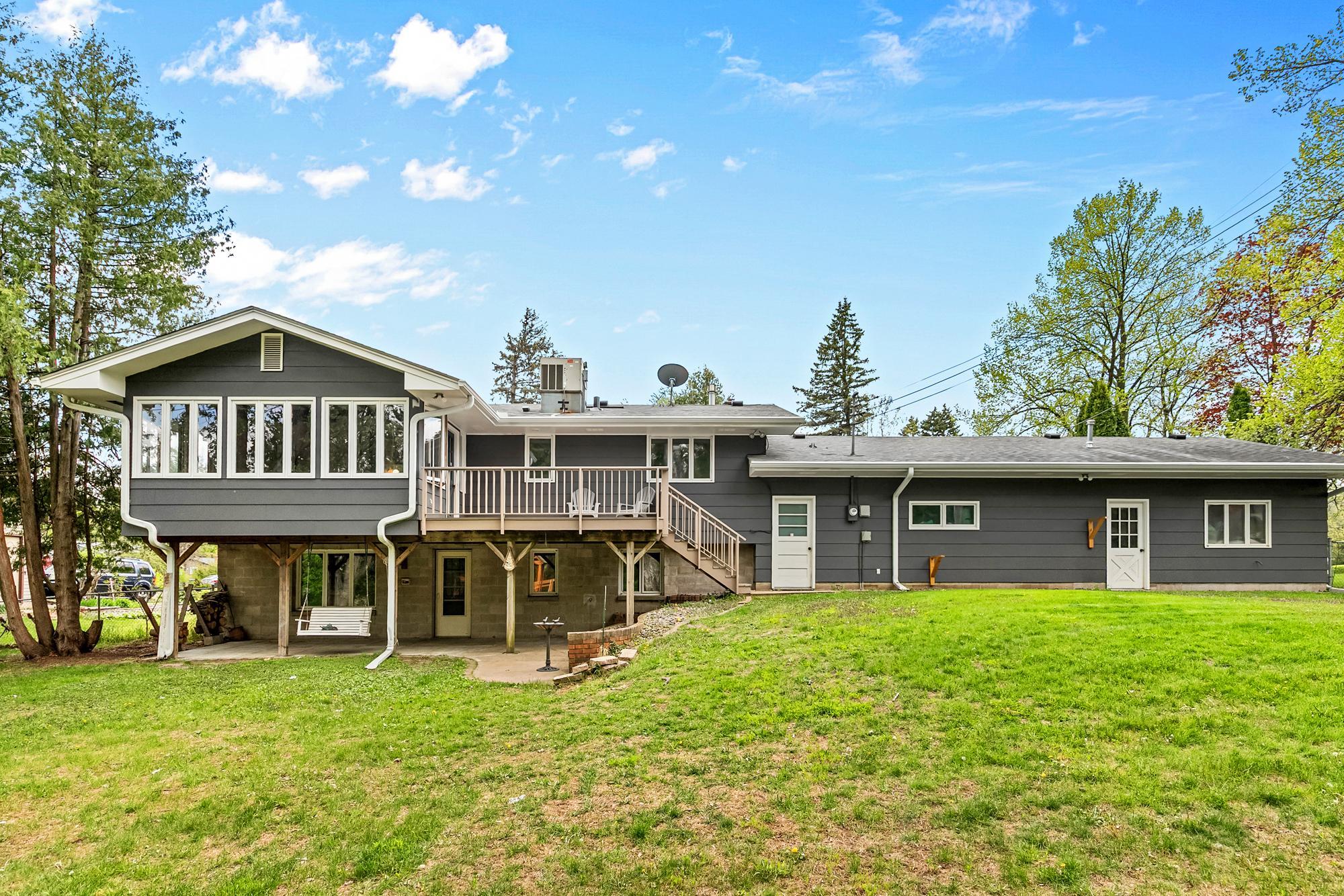 The spacious patio below the sunroom and deck.
