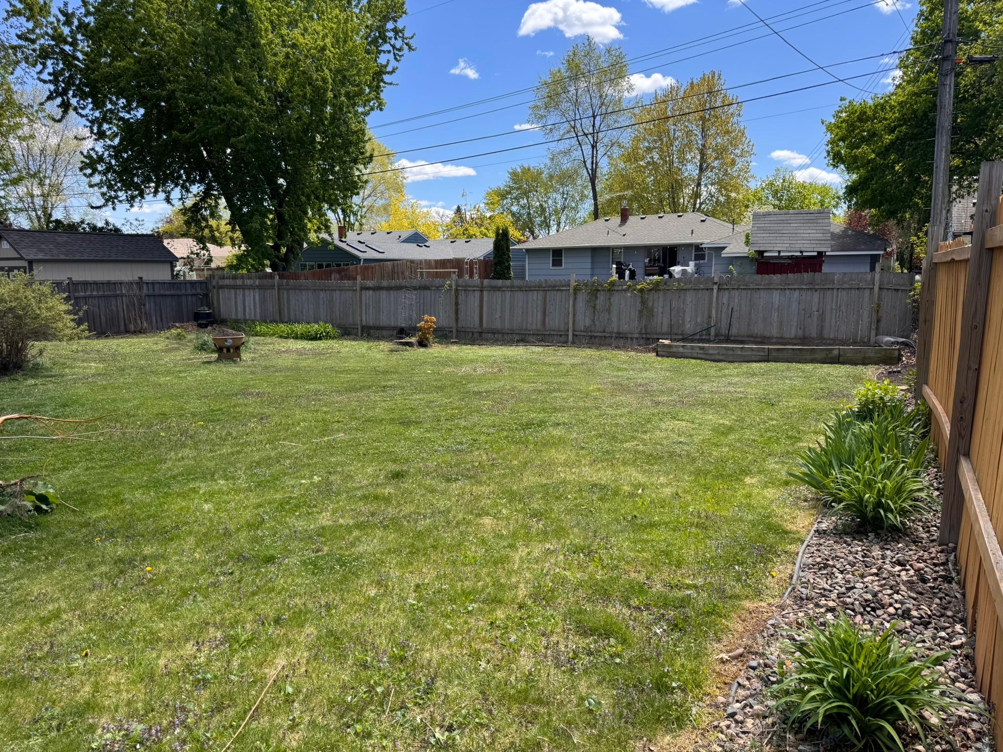This fully fenced backyard is perfect for playdates with kids or pups!