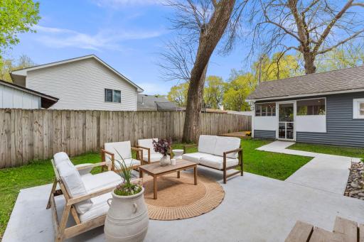The exterior offers multiple spaces designed for relaxing and entertaining. The spacious concrete patio creates a private backyard retreat!