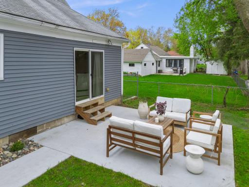 Fresh interior paint (2026), new concrete driveway (2025), new patio (2025), and upper-level AC unit (2025).