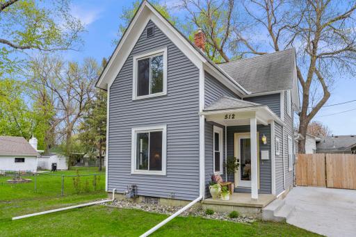 The charming covered front porch enhances curb appeal and adds another welcoming outdoor space to enjoy.