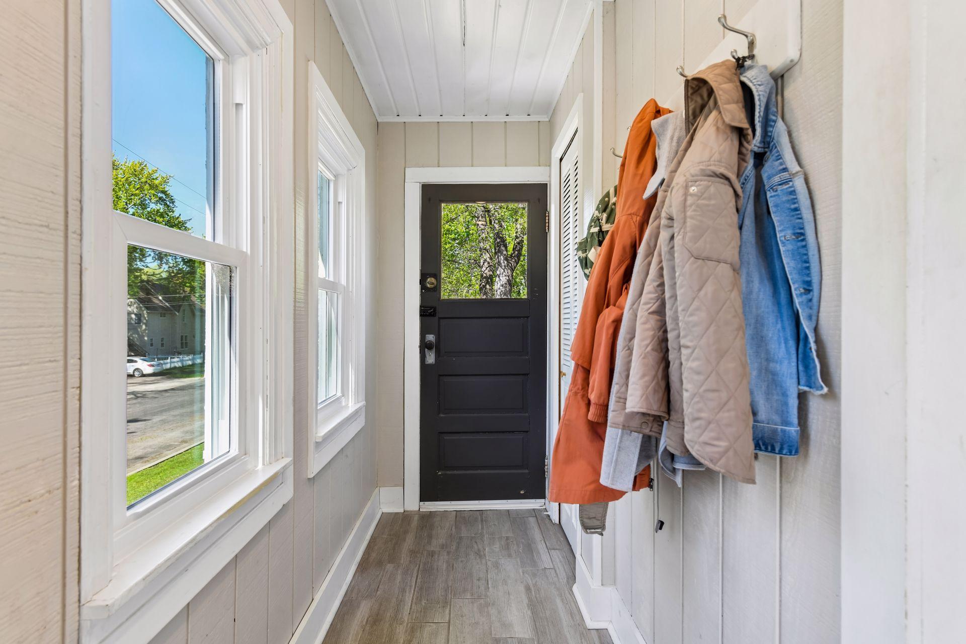 Nice back entryway mud room with new windows