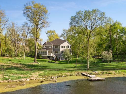 Situated on over 5 acres of privacy with pond views.