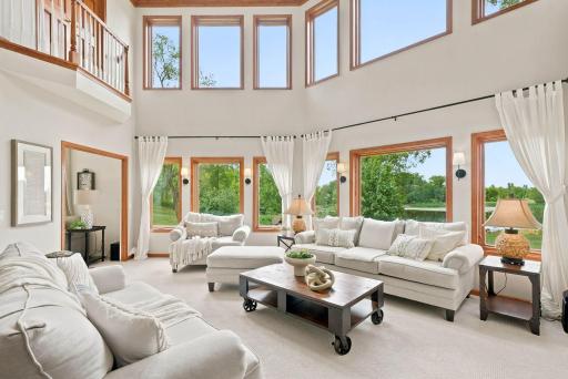 Main floor living room overlooks the pond.