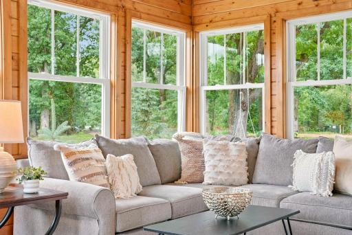 This porch overlooks the pond. Open the windows and enjoy a wonderful Summer breeze.
