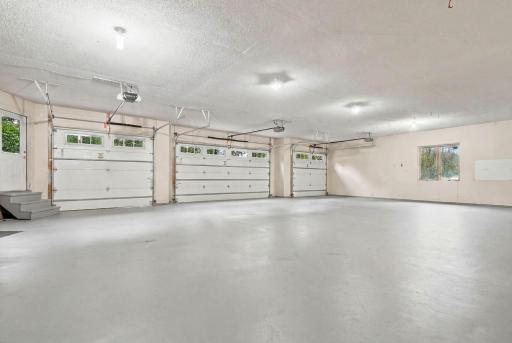 The massive 4+ car garage with in-floor heat awaits you.