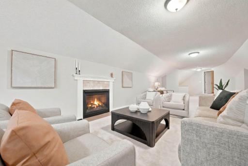 This bonus space is accessible from the upper level or take the private staircase that leads to the garage and lower level.