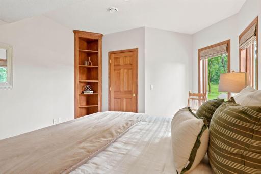 Spacious bedroom with built in and walk-in closet.