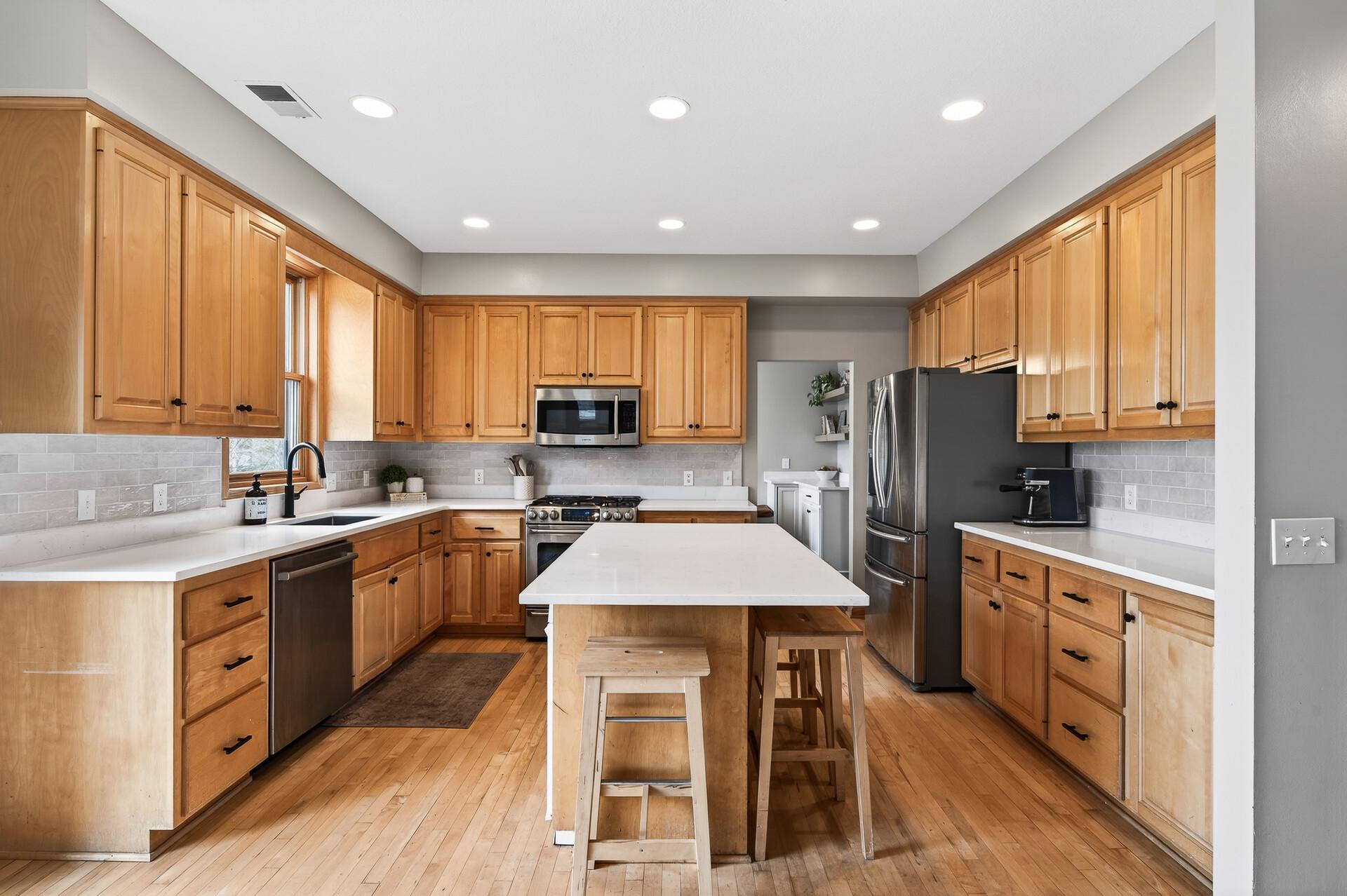 New quartz countertops, zellige tile backsplash