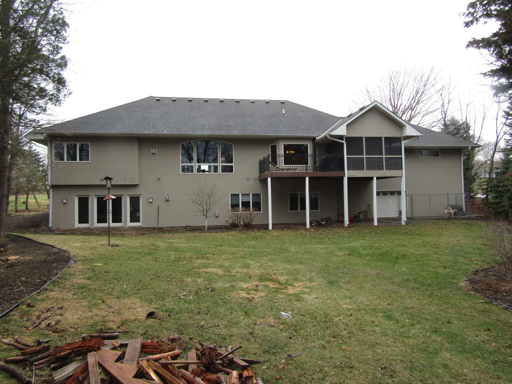 Back of home faces Sand Creek valley.