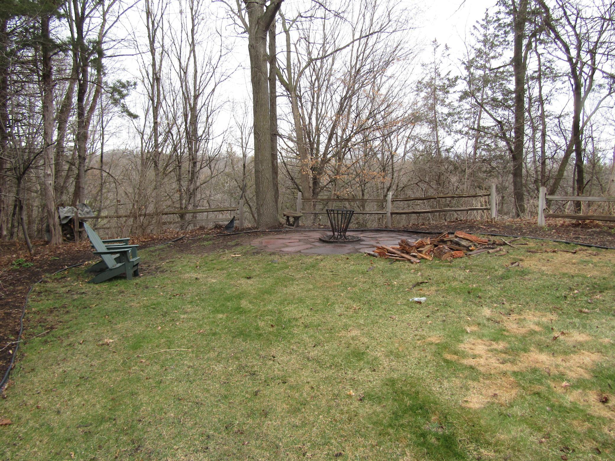 Backyard firepit and views of Sand Creek valley.