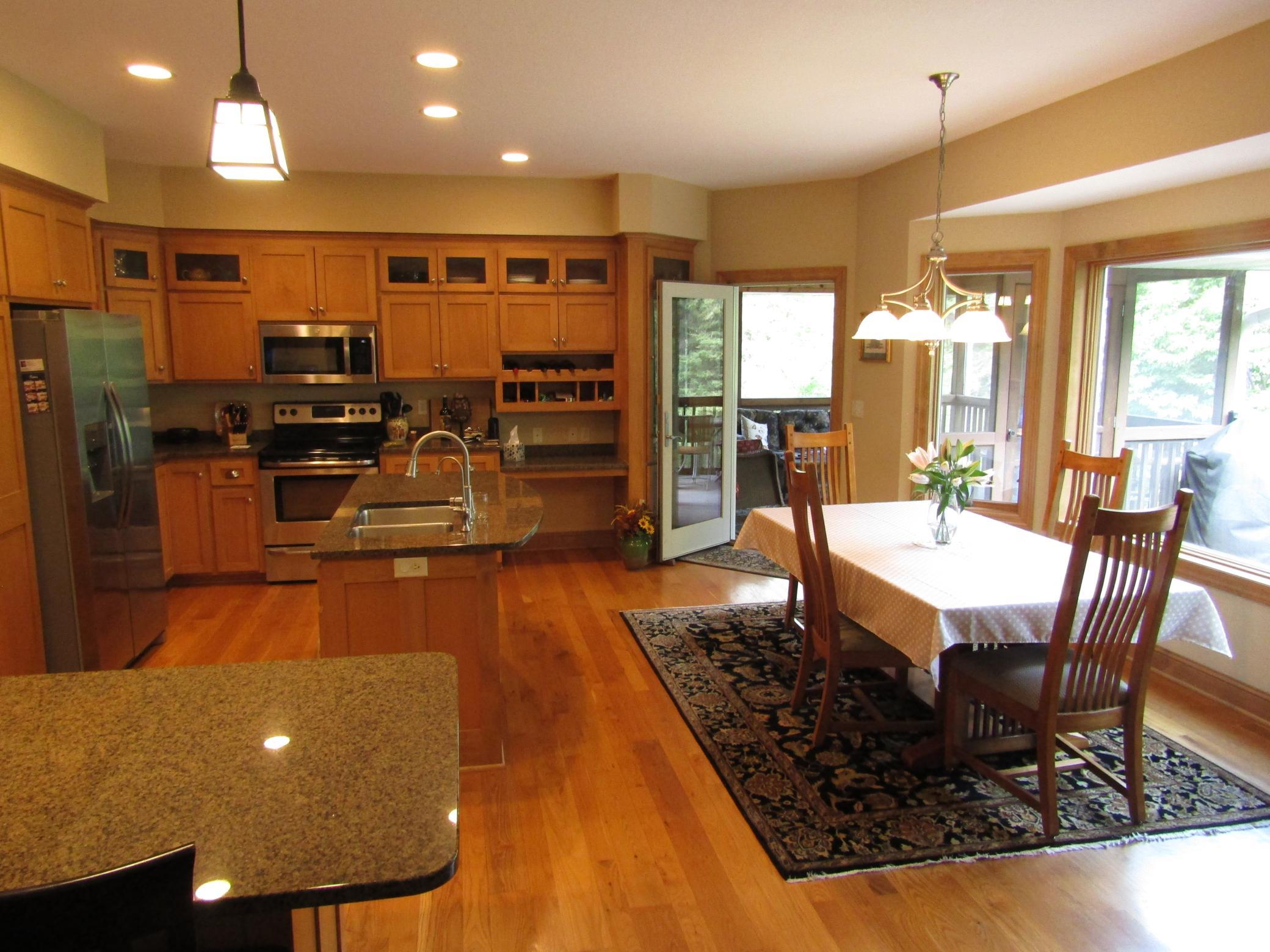 Kitchen w/SS appliances and granite countertops.