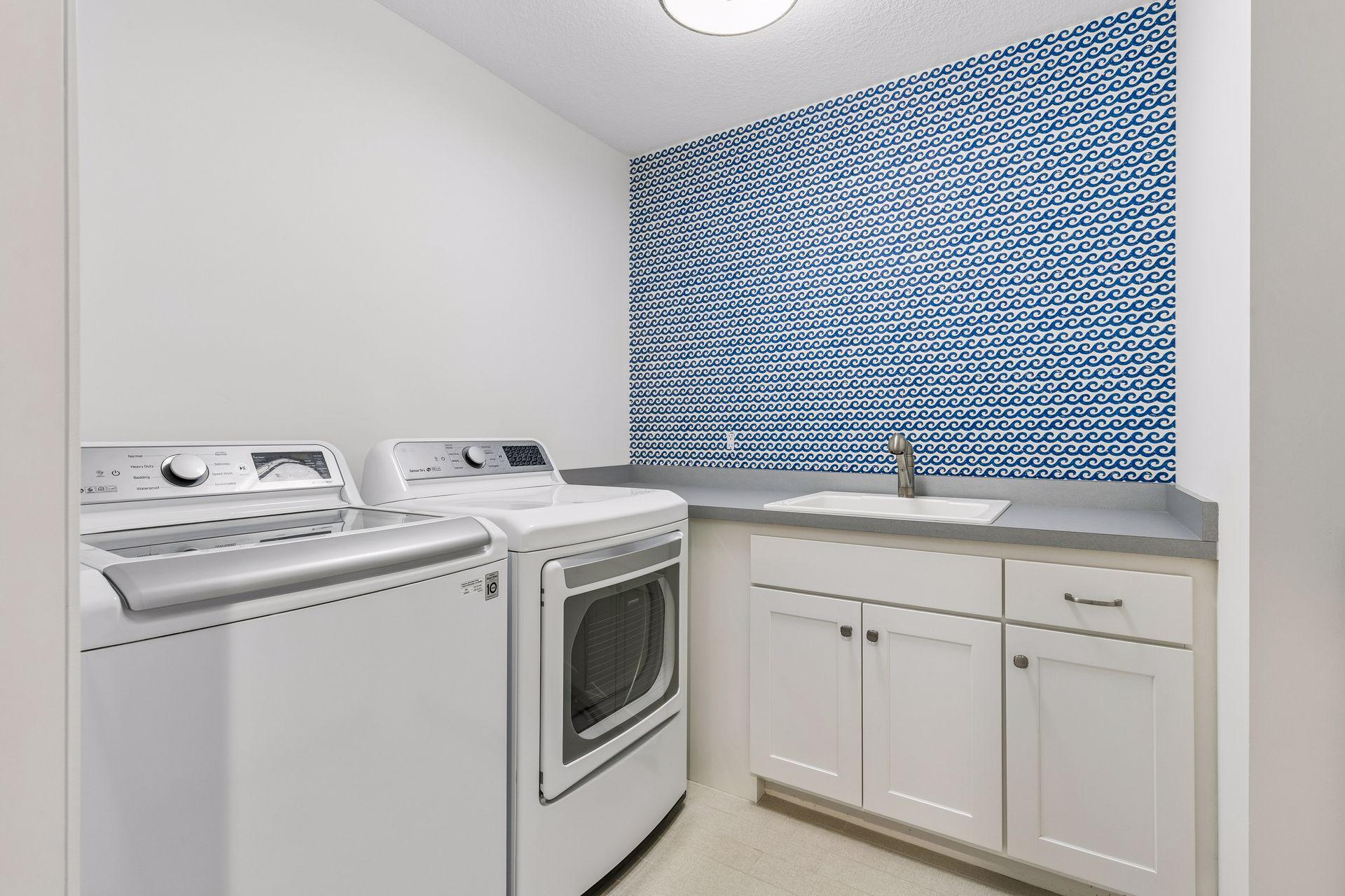 Upper-level laundry room. Second set of washer & dryer in the lower level.