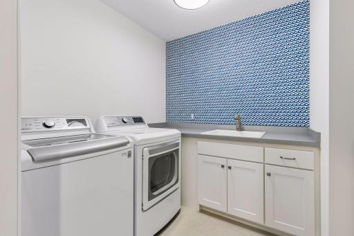 Upper-level laundry room. Second set of washer & dryer in the lower level.
