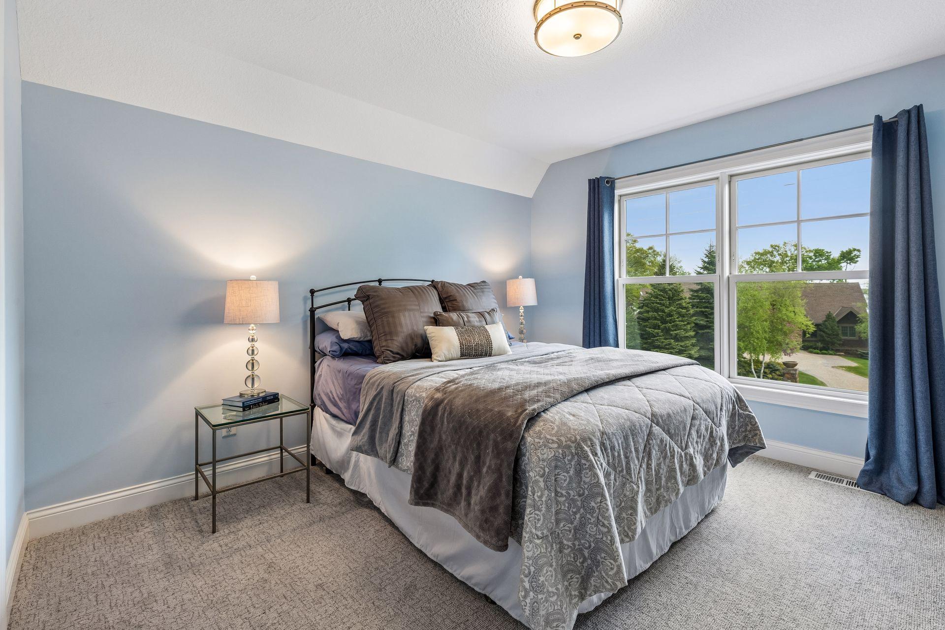 The additional three bedrooms offer neutral décor and thoughtful features.