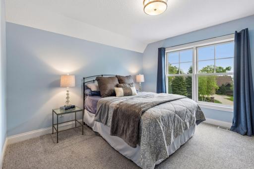 The additional three bedrooms offer neutral dÃ©cor and thoughtful features.