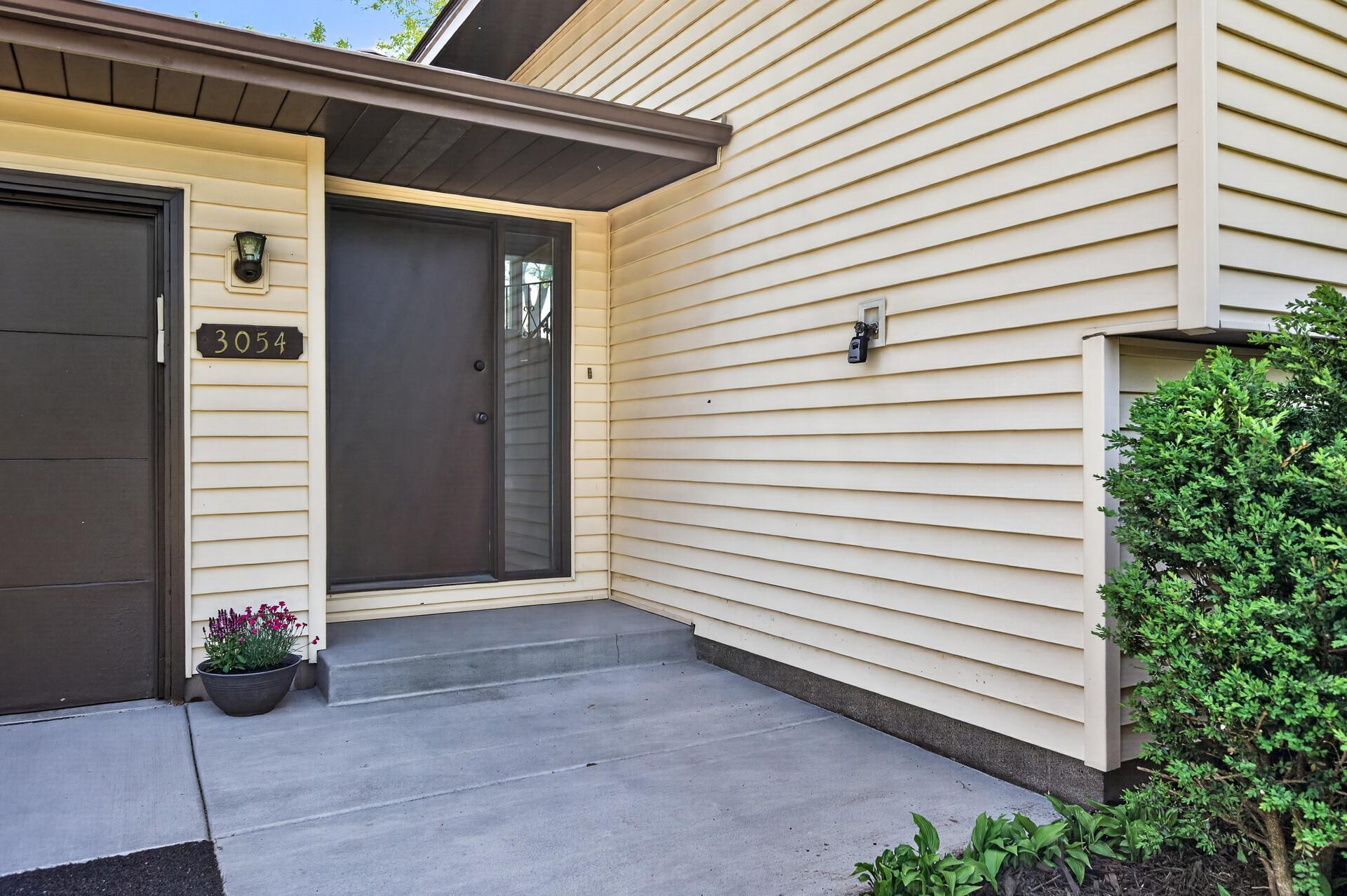 Newly done concrete front porch for a great first impression as you enter!