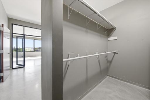 Tucked-away closet with a clean, modern design maximizing storage efficiency.