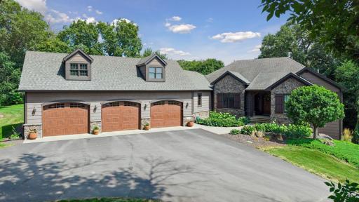 Seeking privacy in the country? Look no further! This home is a SHOW STOPPER with incredible detailing throughout. Reclaimed beams from 100 yr old barn, hard scraped hardwood floors, stunning details both inside and out. Waconia Schools #110.