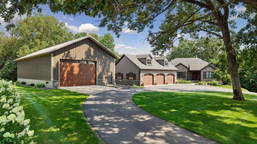 First time available 3+acres in Waconia schools. Stunning 2014 Sondergaard Forcier custom built walkout rambler nestled in nature, tranquility and privacy PLUS 60x32 heated shed for toys, storage, AND indoor sport court to BOOT with in shed.