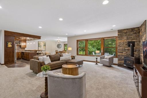 Designed to be the heart of every gathering, this expansive lower level invites loved ones to connect, celebrate, and unwind. From game days to holidays, create unforgettable memories around the fireplace while enjoying beautiful backyard views.