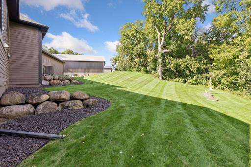 Private 3-acre homesite showcases sweeping green space, mature trees, and beautifully manicured grounds. Enjoy room to roam, unmatched privacy, and peaceful views that create the perfect backdrop for everyday living and entertaining.