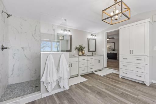 Owner's suite private bathroom with spa-like amenities including a soaker tub.