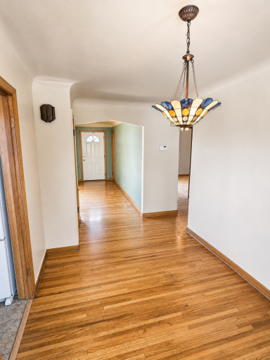 Dining area to Livingroom and hall to main level bedrooms and the bathroom.