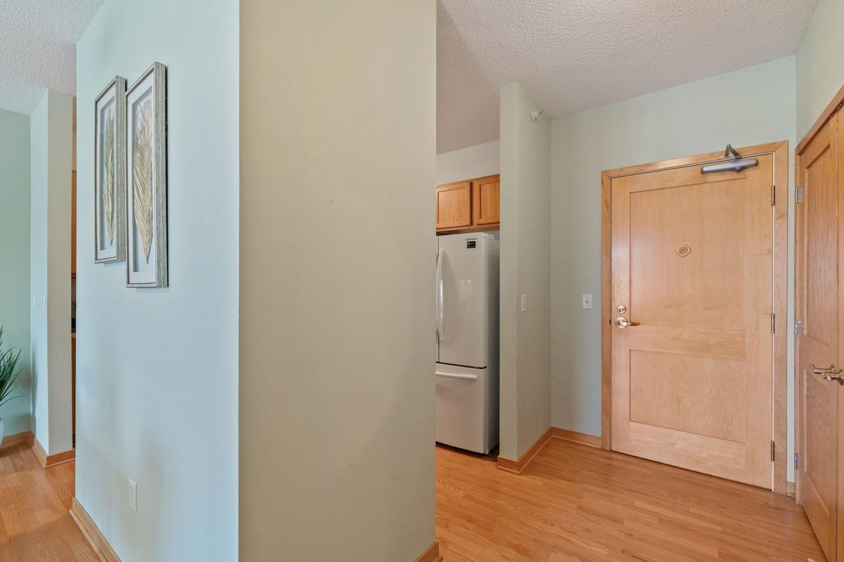 The entryway has a big closet and solid maple entry door for great soundproofing.