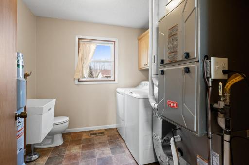 1/2 Bath with laundry and utility room- washer and dryer included