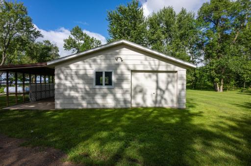 Double detached garage with half used as storage room