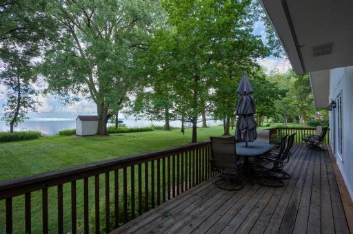 Enjoy relaxing on the large lakeside deck