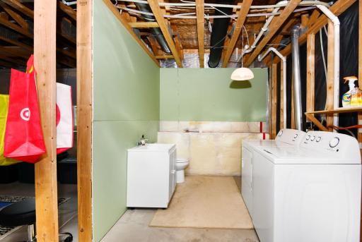 The 3/4 bath in the lower is roughed-in and stool and sink are already installed and operating~convenient combo with the laundry!