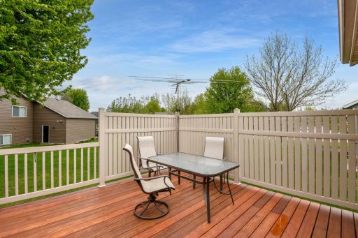 Custom deck railing adds privacy and charm
