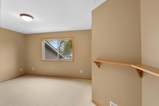 The primary suite features a generous walk-in closet and full walk-thru bath