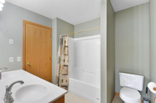 A double vanity makes great use of this spacious bath