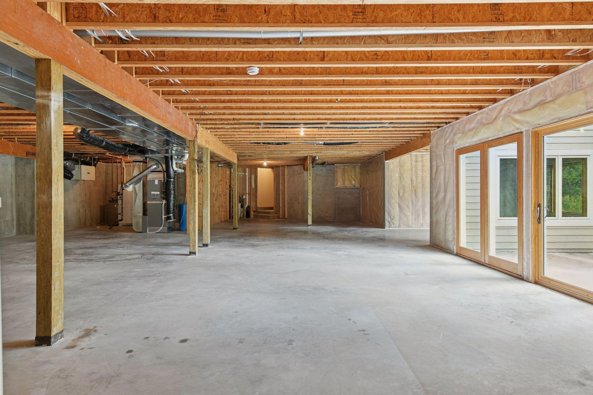 Full unfinished lower level has in floor heat and walks out to the 288 sq ft stamped concrete patio