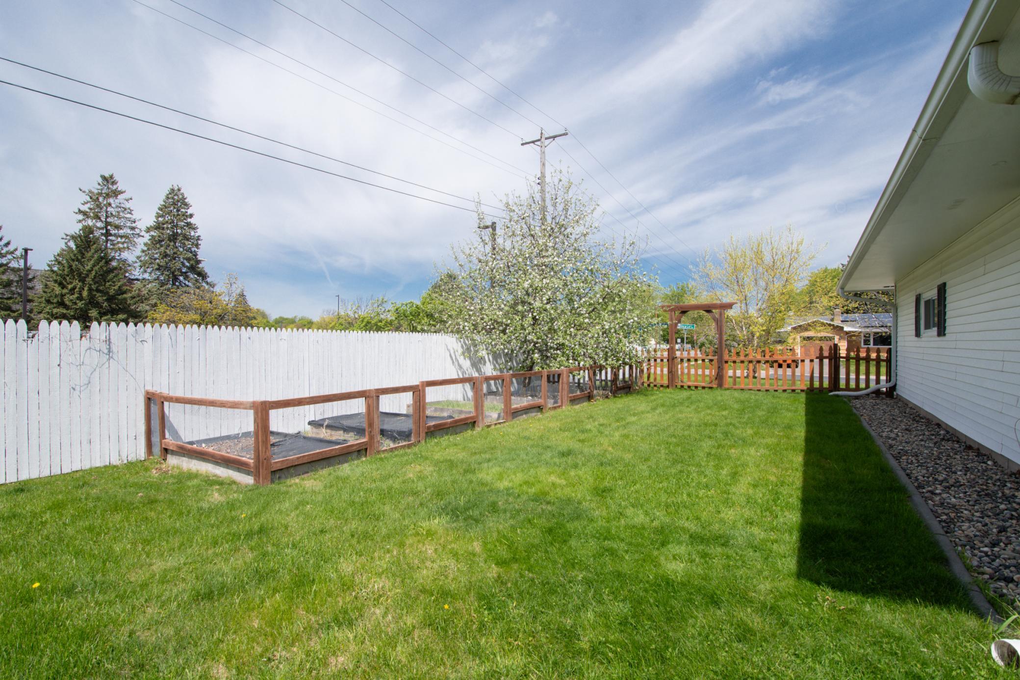Four raised gardens are enclosed and ready for summer use!