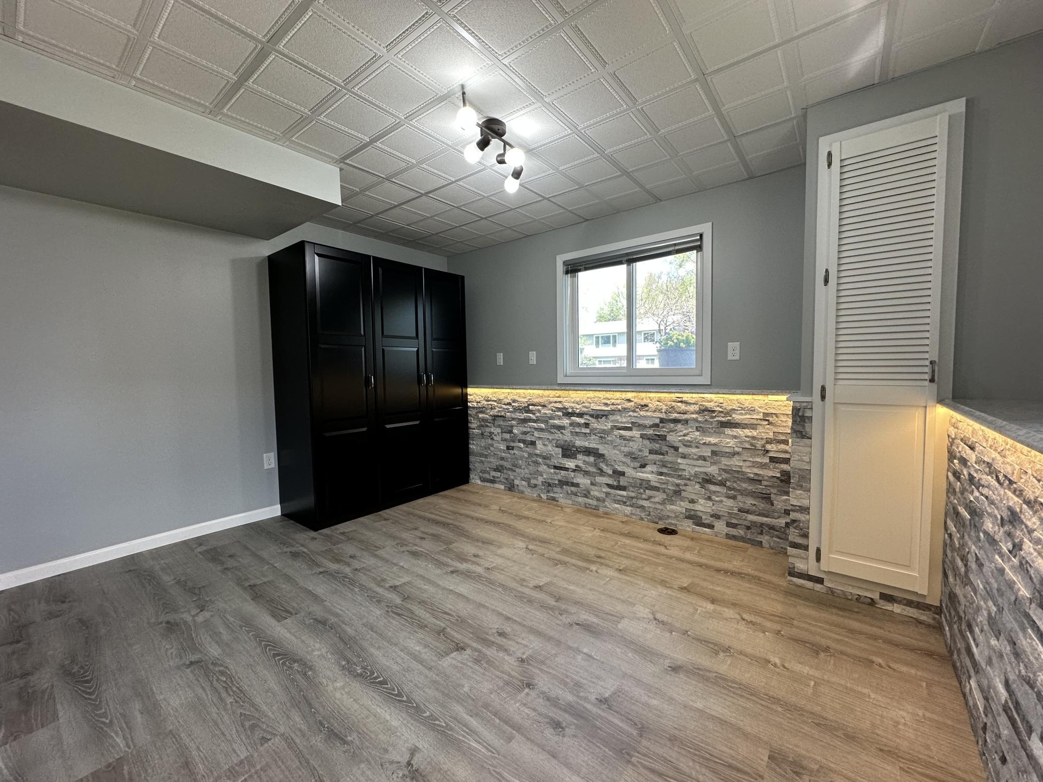 Fourth Bedroom with Quartz Ledge and Undermount Lighting