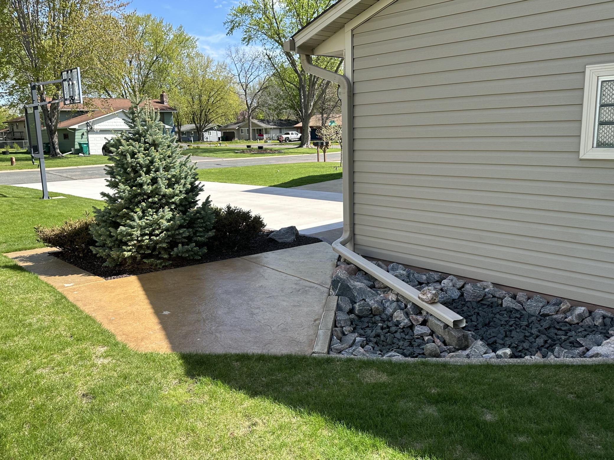 Stamped Colored Concrete and Plantings NW Corner of Garage