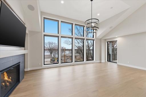 Photo of previous build overlooking a lake by Hampton Companies.