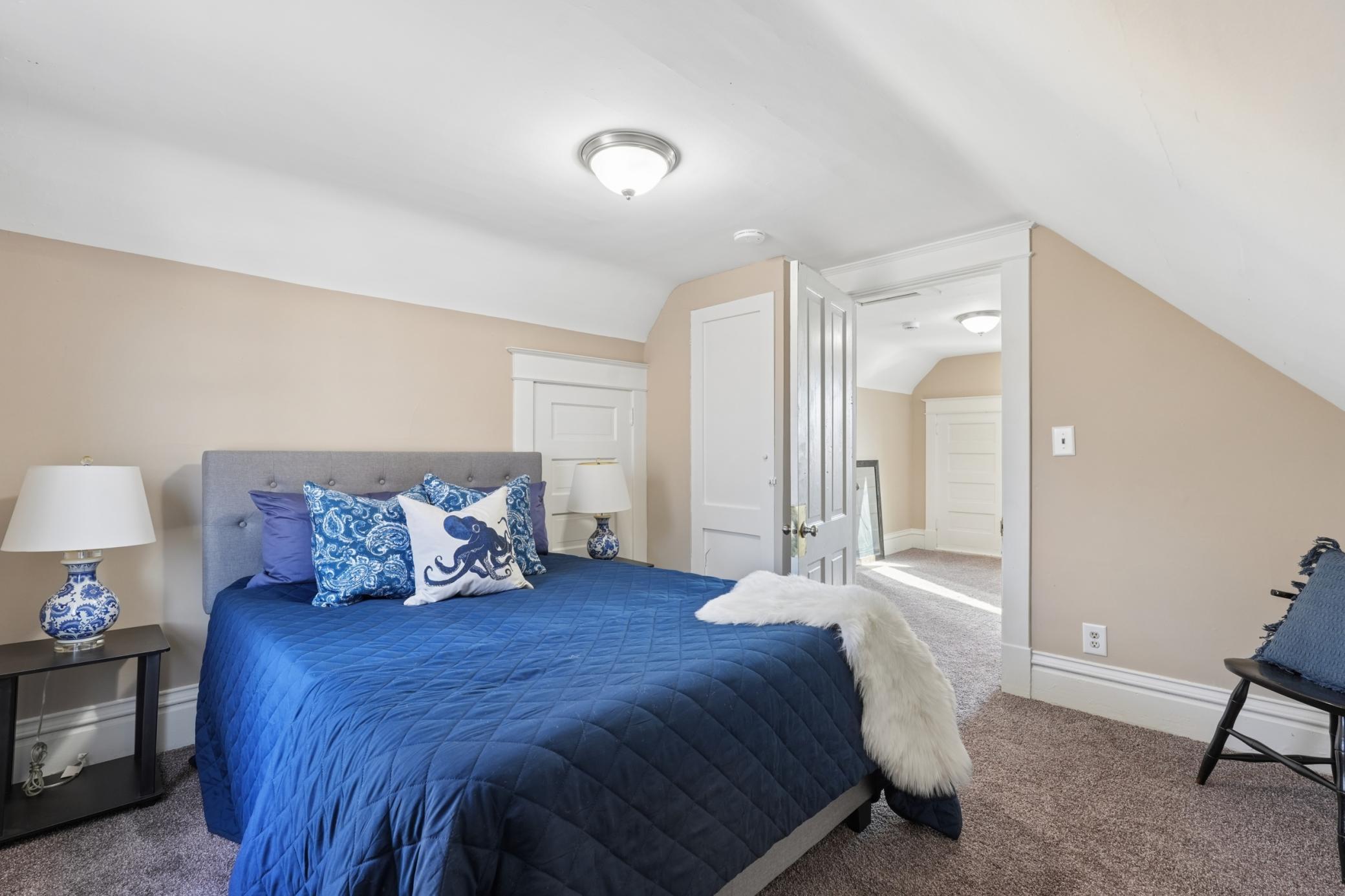 Spacious upper bedroom offering flexible layout options.
