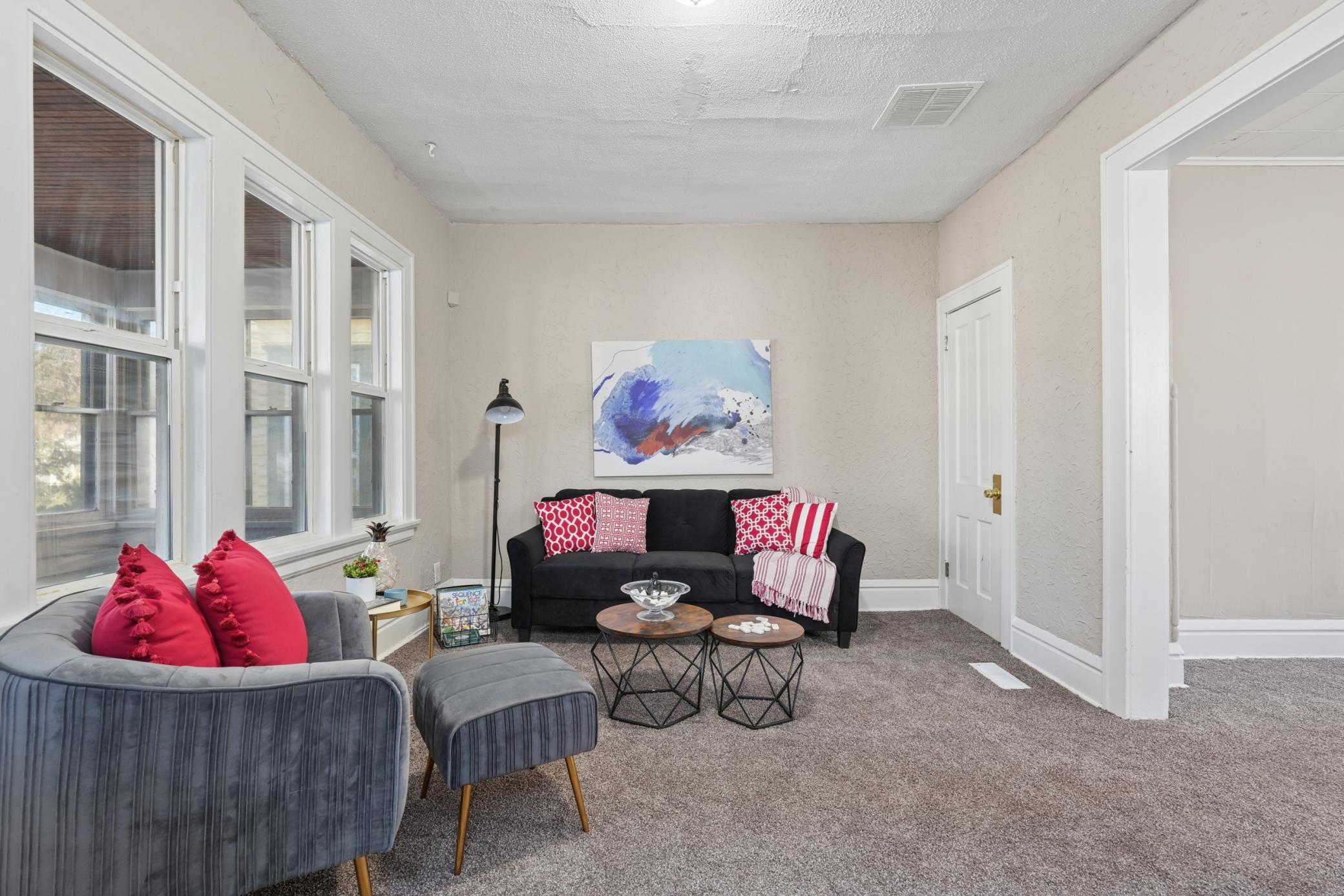 Generous living space with neutral tones and updated flooring throughout.
