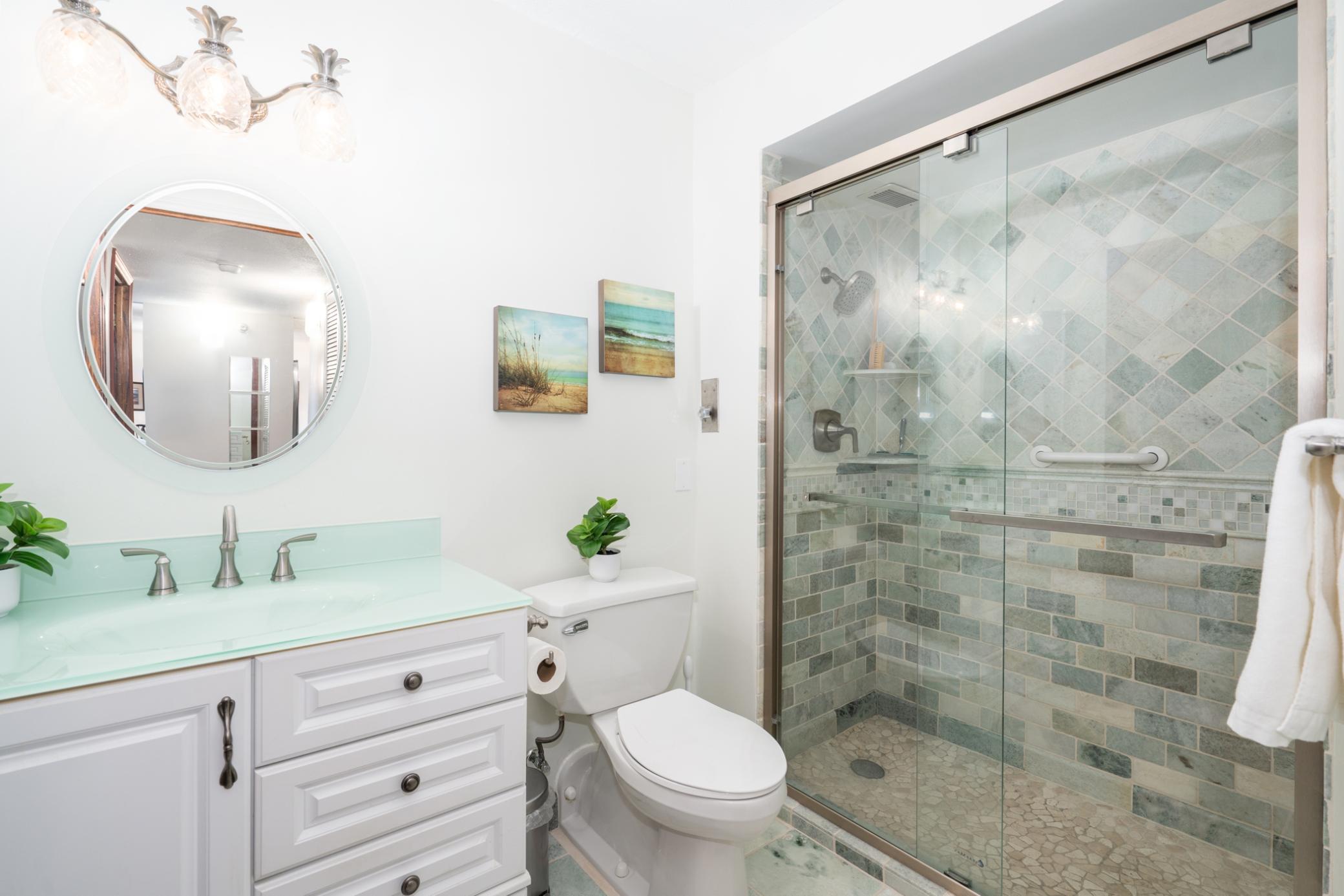 Updated tiled bath with walk-in shower