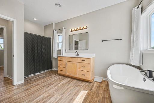Primary bathroom with soaking tub and separate shower